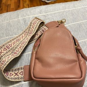 Ah Dorned pink crossbody bag with patterned handle